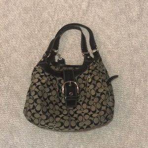 Black and gray coach purse